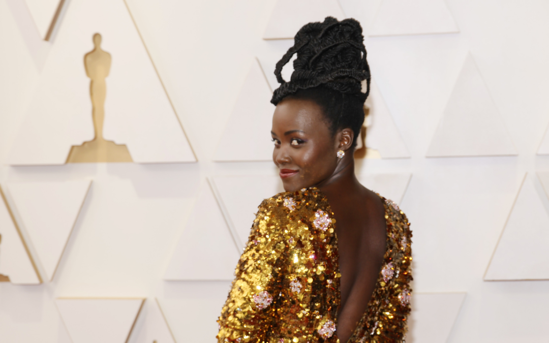 We Love Lupita Nyong'o's Fishtail Loc Updo at the Oscars 2022