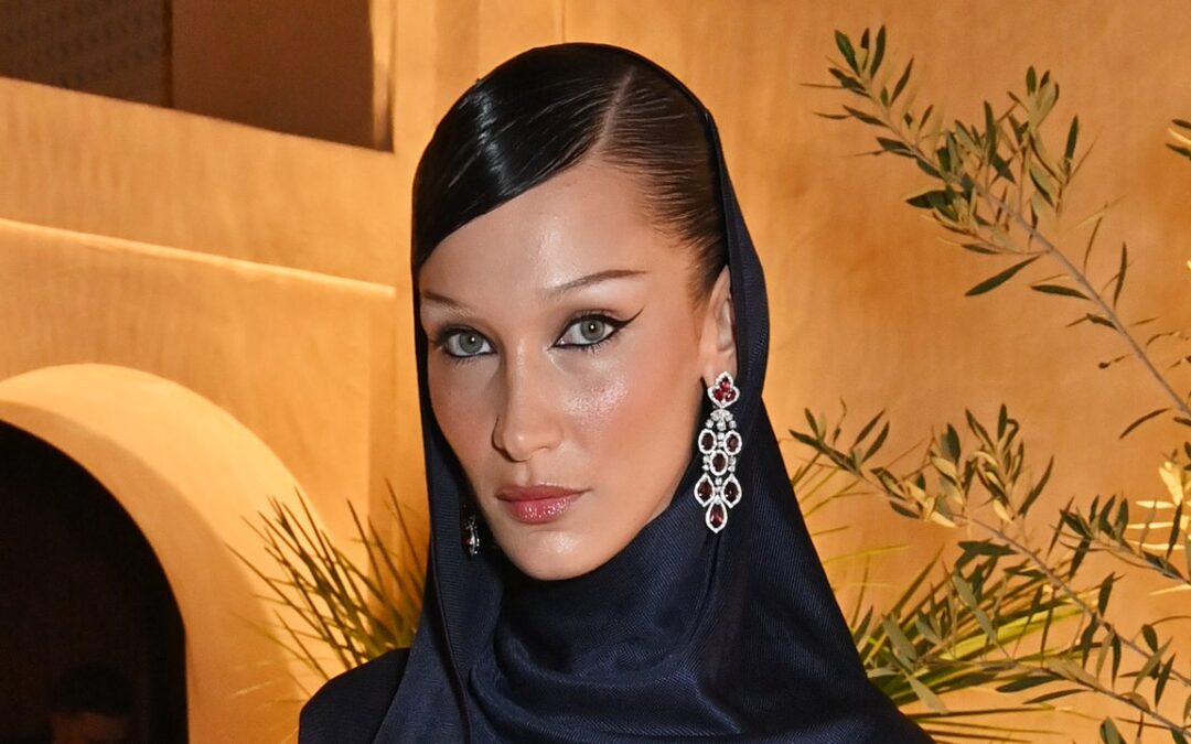 Bella Hadid Is Channeling Marilyn and Madonna In a Curly Platinum-Blonde Bob — See Video