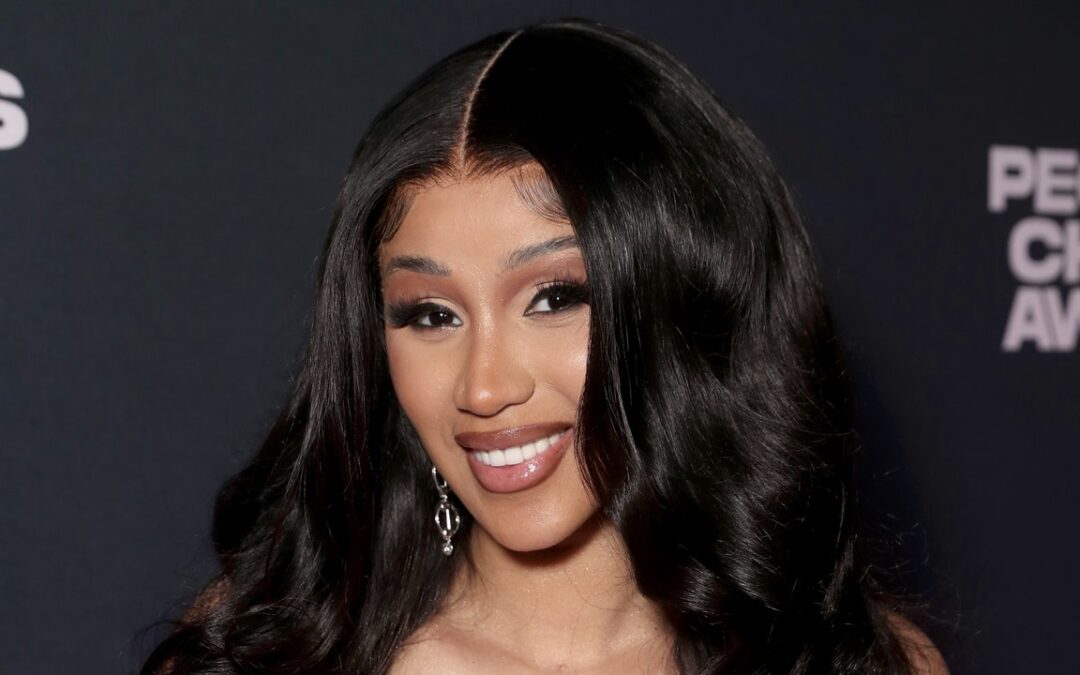 I Can’t Tell Where Cardi B’s Extra Long Hair Begins and Her Cape Dress Ends — See the Photos