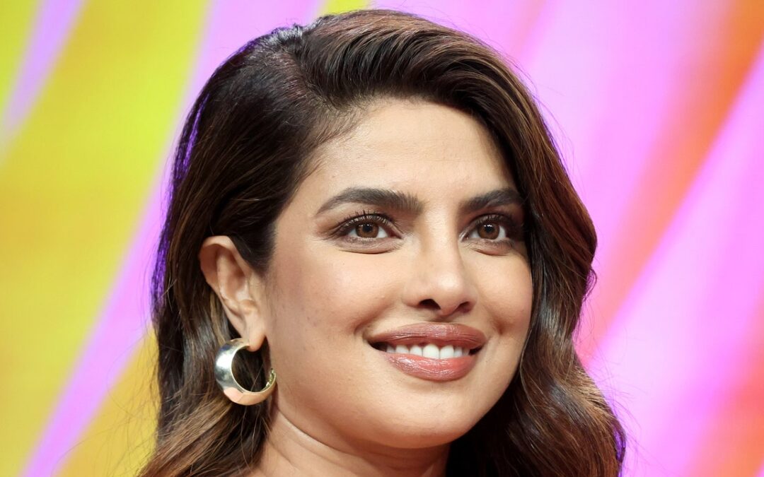 Priyanka Chopra Paired a 65-Year-Old Upcycled Saree With Waist-Length Extensions — See Photos