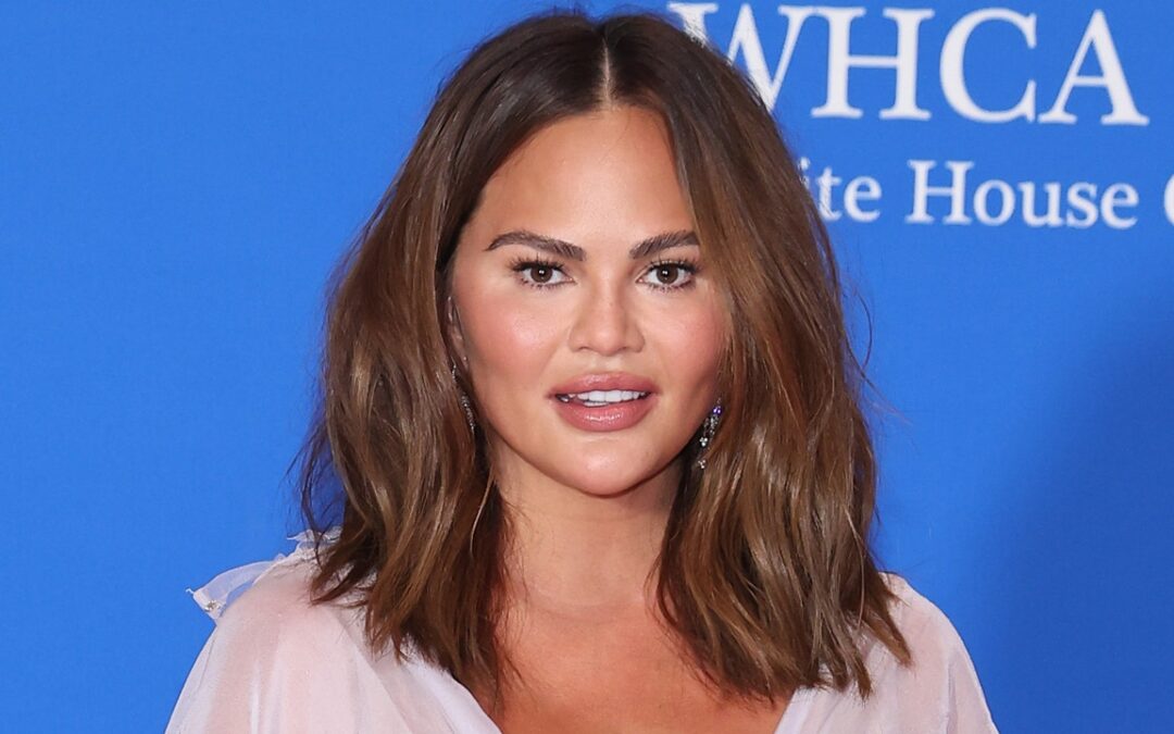 Chrissy Teigen’s Got Hair So Long, You Can’t Tell Where It Ends — See Photos