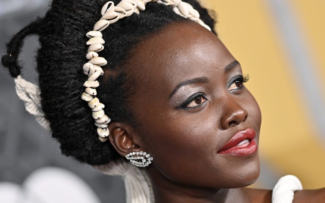 Lupita Nyong’o Used Her Shaved Head as a Canvas for an Intricate Henna Tattoo — See Photos
