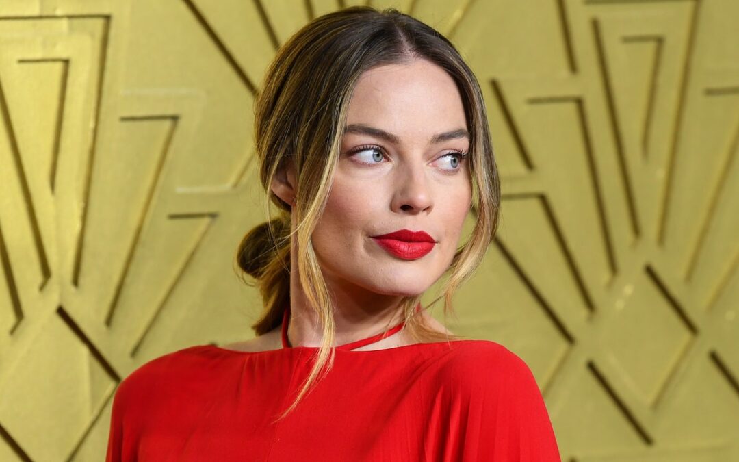 Margot Robbie Went Full Hippie for Her Latest Look, Perfect Beach Waves Included — See Photos