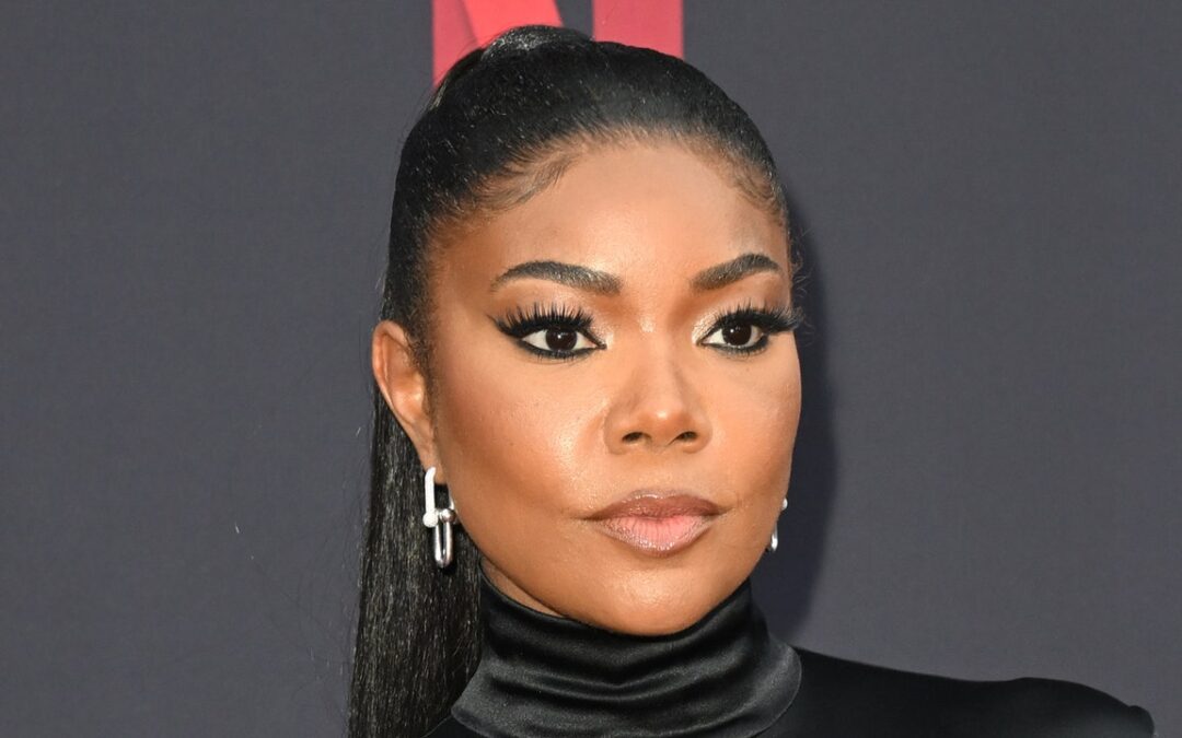 Gabrielle Union Wore the Most Fitting Hairstyle for Frolicking in the Ocean — See Photos
