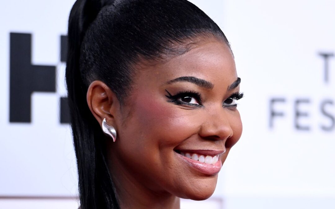 Perfection Isn’t Real, But Gabrielle Union’s Real Close With These Glossy Mermaid Waves — See Photos