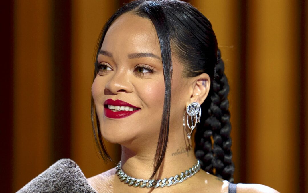 Rihanna’s Baby Reveal Pics Are Cute, Sure, But Can We Talk About Her Tower of Curls? See Photos