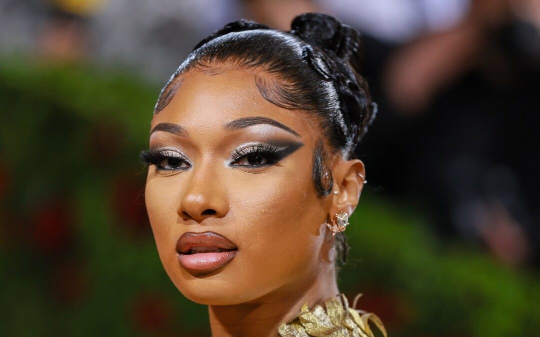 I’m Pretty Sure Megan Thee Stallion’s Hair Is Longer Than the Snake She’s Holding — See Photos
